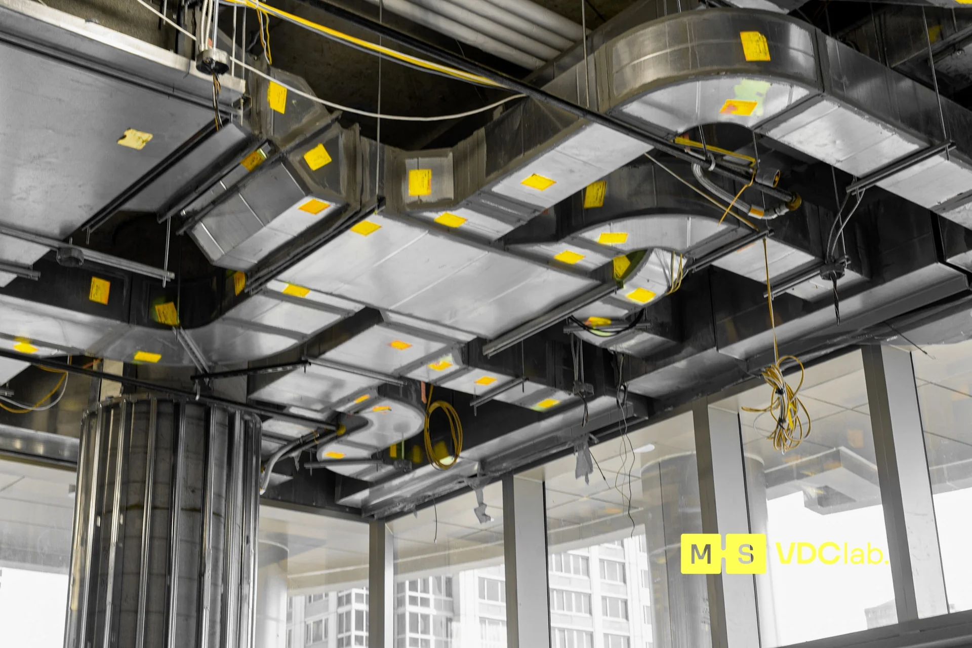 HVAC sheet-metal ductwork at ceiling, fabricated from SMACNA shop drawings